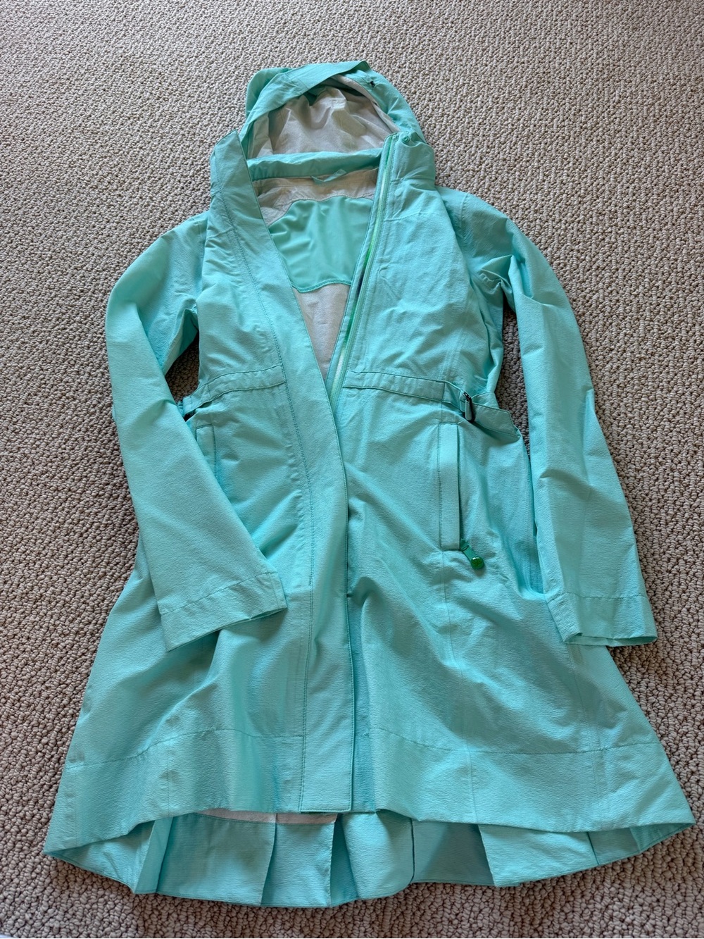 Vintage Lululemon medium length teal rain jacket